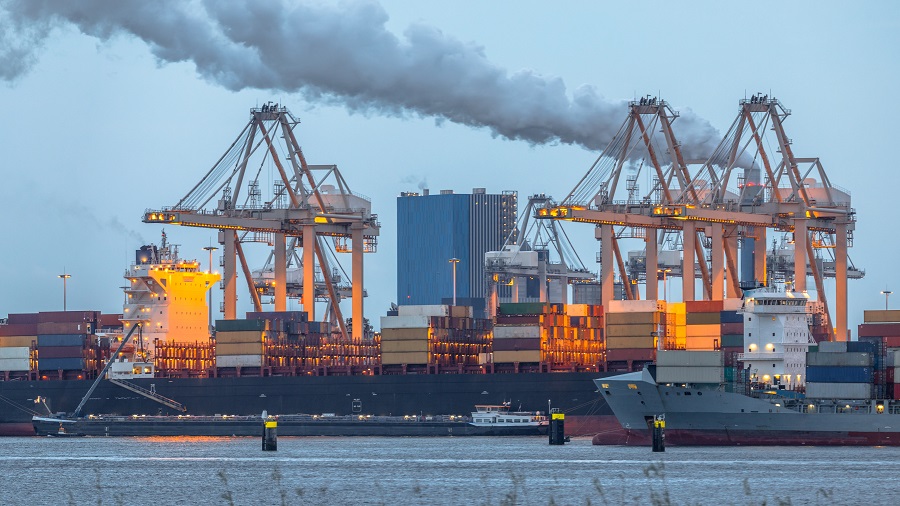 Container ships loading at Port of Rotterdam