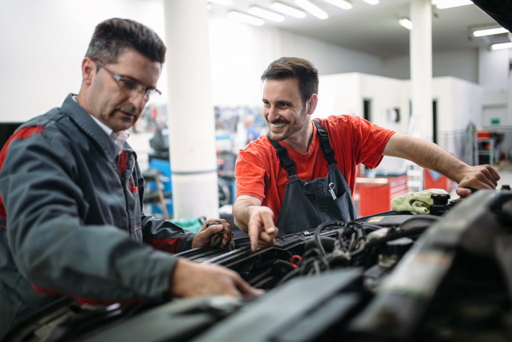 Red Seal Certified mechanics work on a car